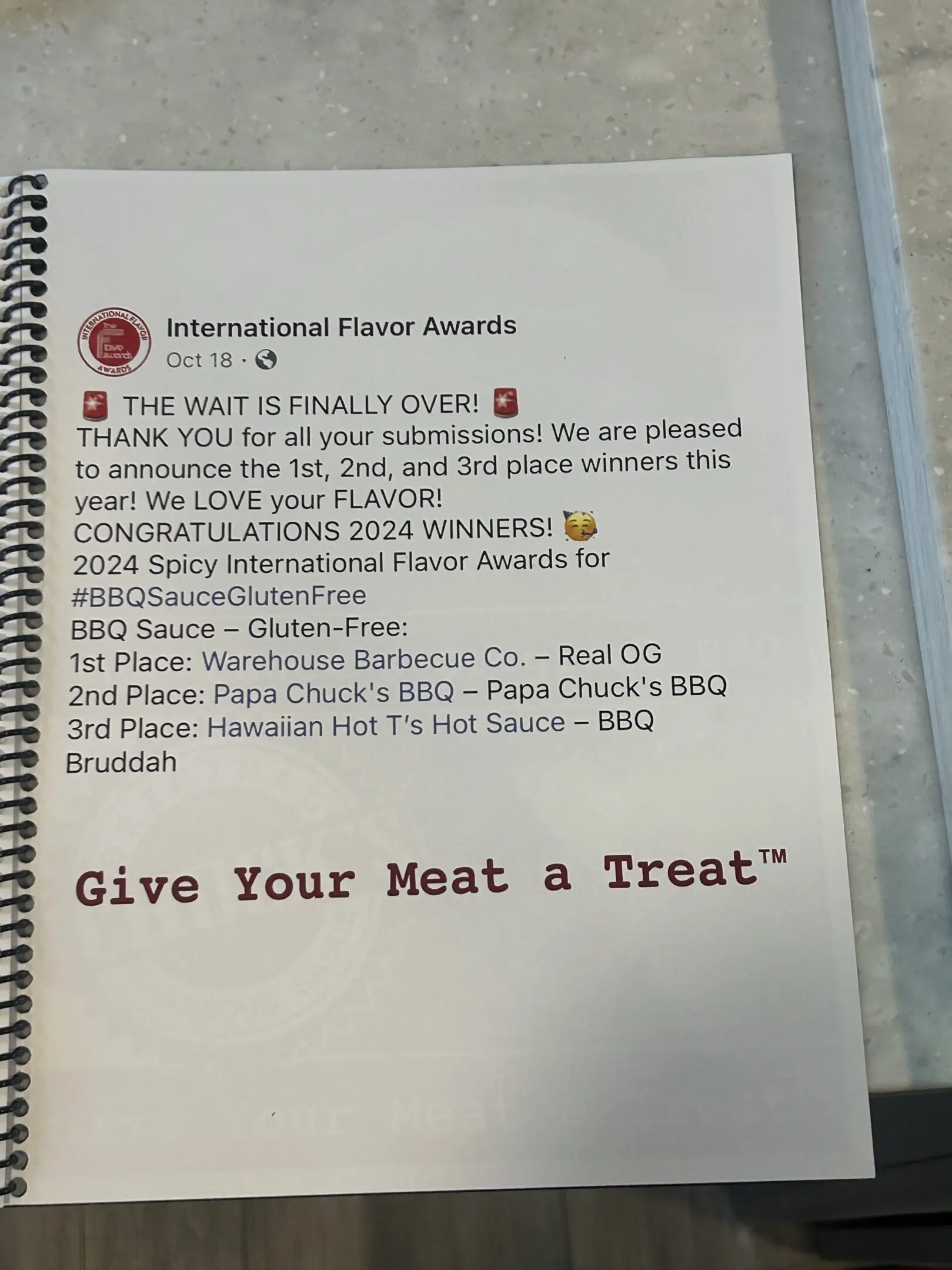 Spiral-bound page announcing BBQ sauce award winners